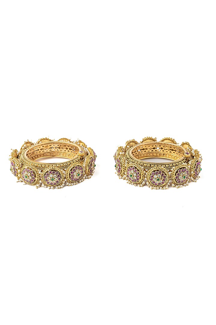 Gold Finish Kundan Polki Bangles (Set Of 2) by Vivinia By Vidhi Mehra at Pernia's Pop Up Shop