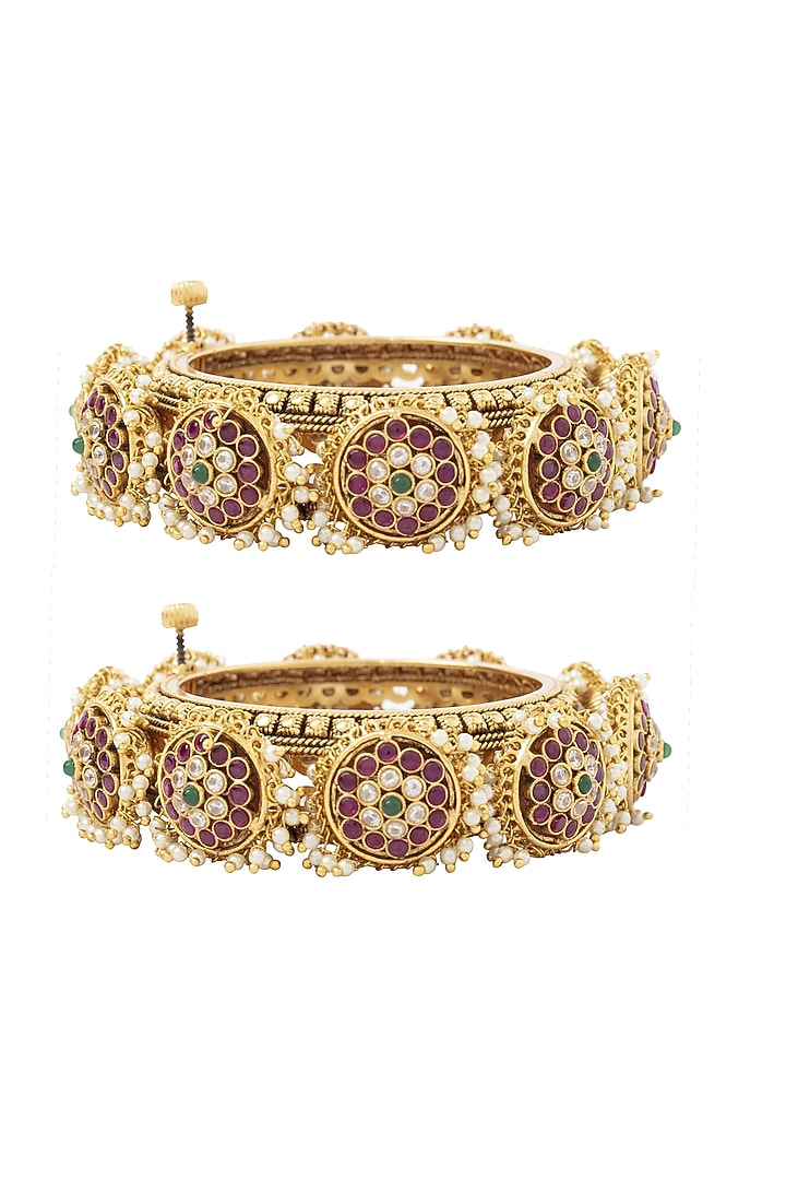 Gold Finish Kundan Polki Bangles (Set Of 2) by Vivinia By Vidhi Mehra at Pernia's Pop Up Shop