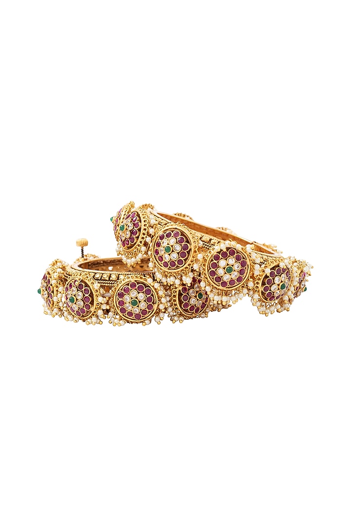 Gold Finish Kundan Polki Bangles (Set Of 2) by Vivinia By Vidhi Mehra at Pernia's Pop Up Shop