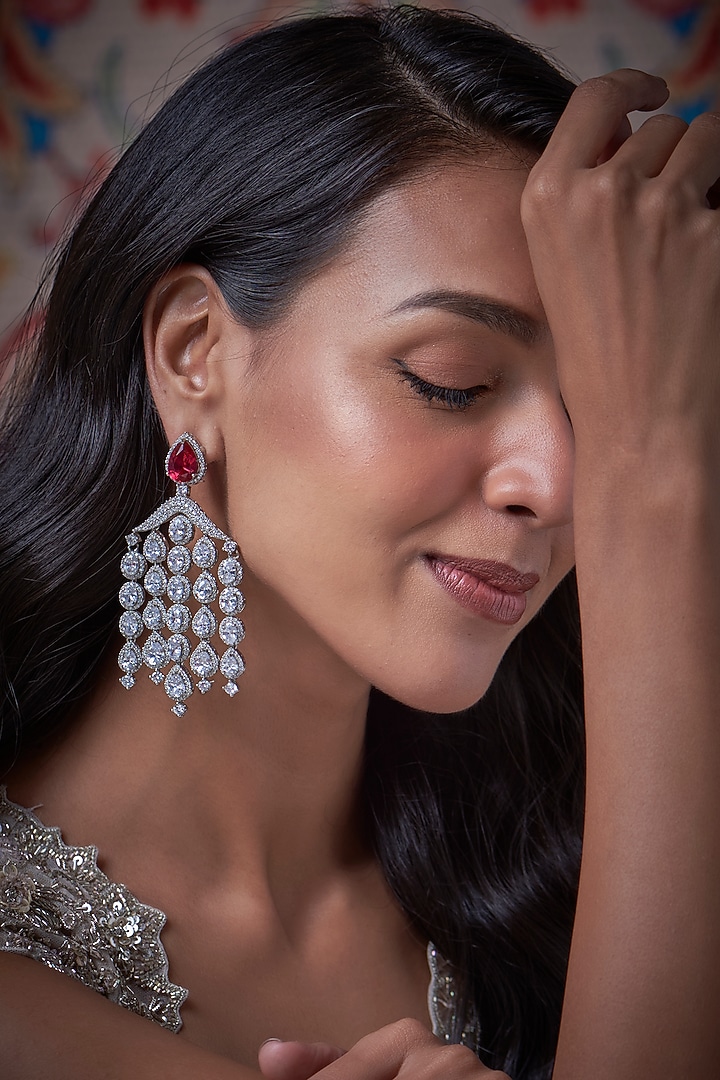 White Finish Zircon Dangler Earrings by Vivinia By Vidhi Mehra at Pernia's Pop Up Shop