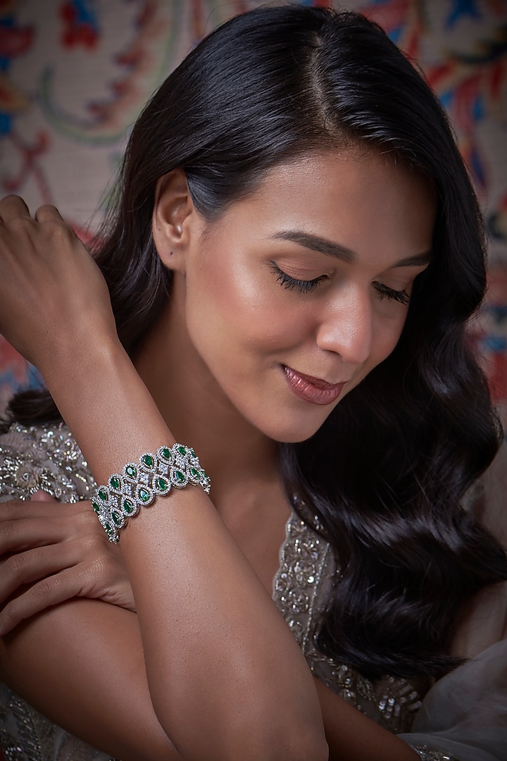 White Finish Zircon & Green Stone Tennis Bracelet by Vivinia By Vidhi Mehra at Pernia's Pop Up Shop