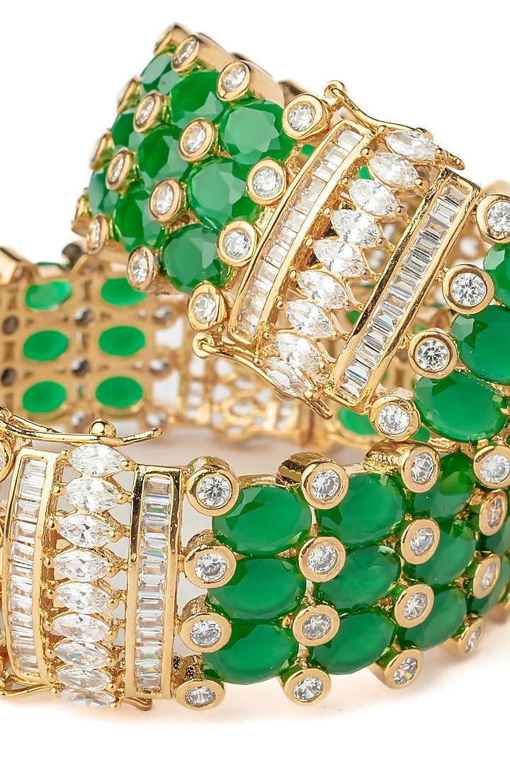 Gold Finish Kundan Polki & Green Stone Bangles (Set Of 2) by Vivinia By Vidhi Mehra at Pernia's Pop Up Shop