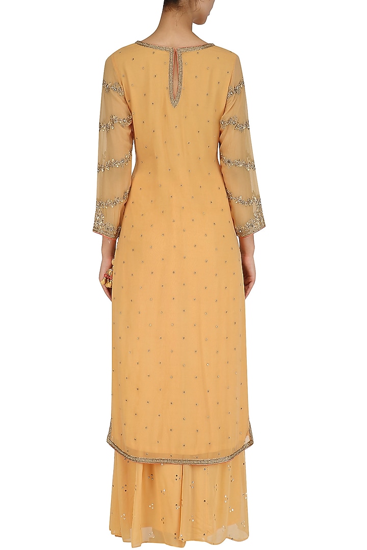 Orange zardozi embroidered kurta and palazzo pants set available only at Pernia's Pop Up Shop.