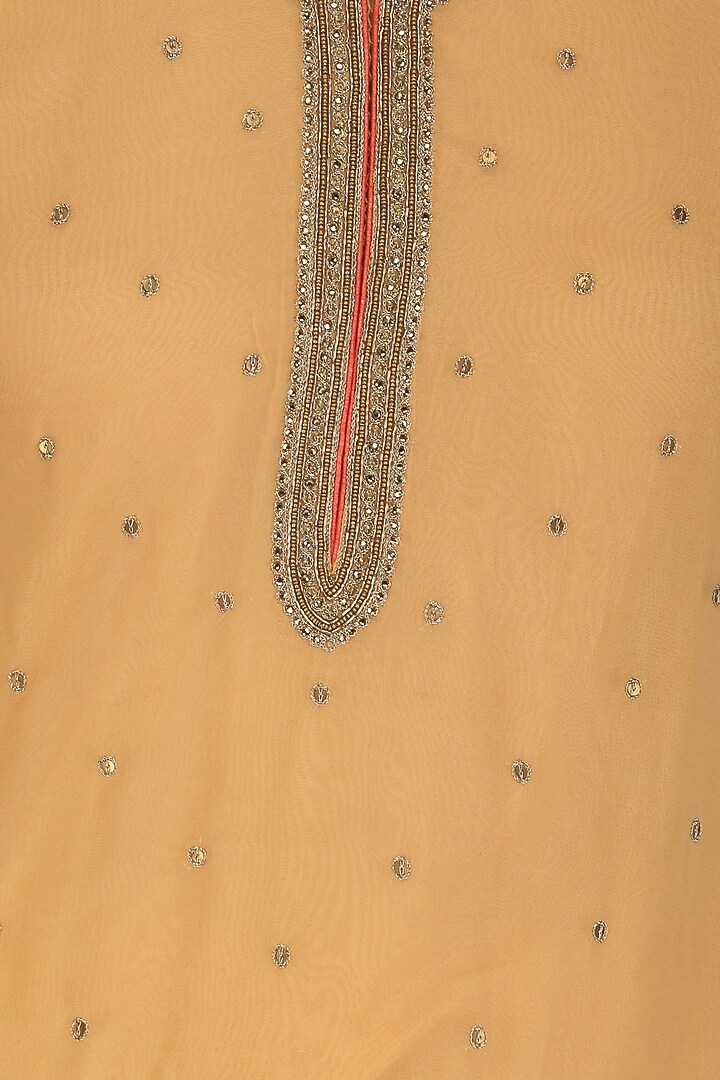 Orange zardozi embroidered kurta and palazzo pants set available only at Pernia's Pop Up Shop.