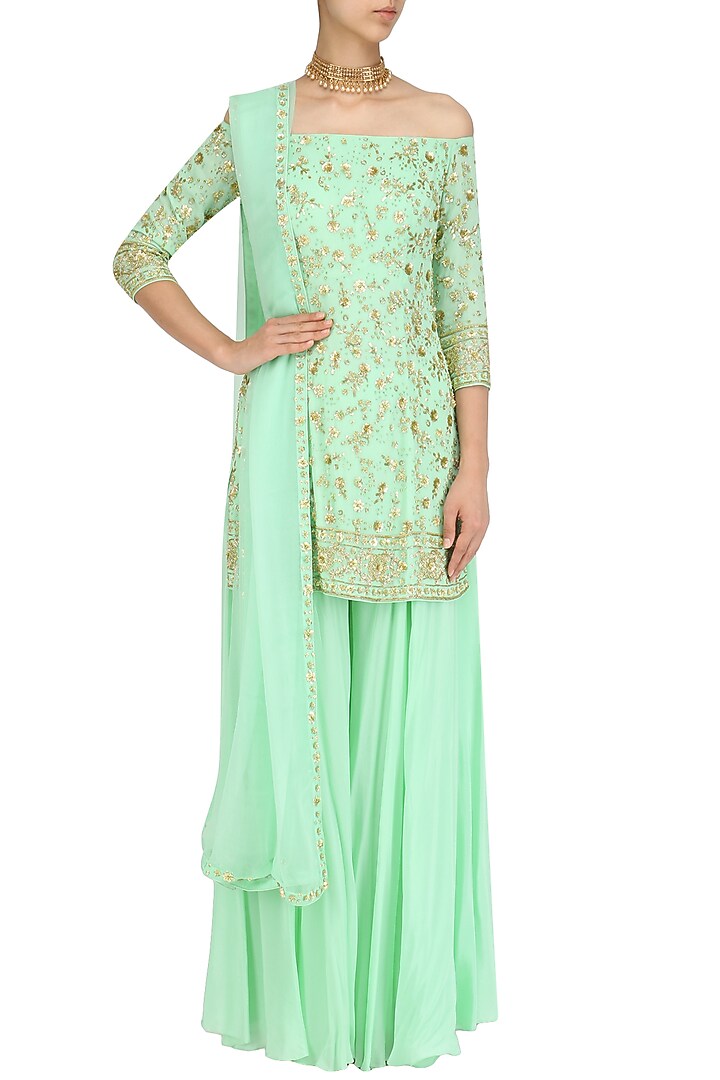 Mint green off shoulder short kurta and sharara pants set available only at Pernia's Pop Up Shop.