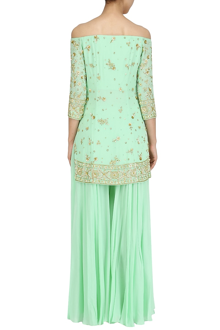 Mint green off shoulder short kurta and sharara pants set available only at Pernia's Pop Up Shop.