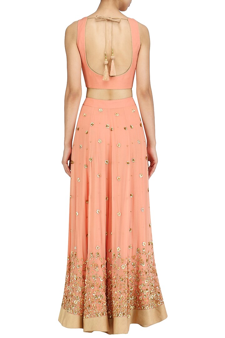 Peach embroidered lehenga set available only at Pernia's Pop Up Shop.