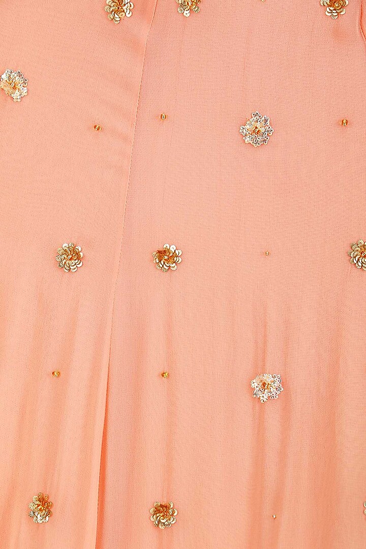 Peach embroidered lehenga set available only at Pernia's Pop Up Shop.