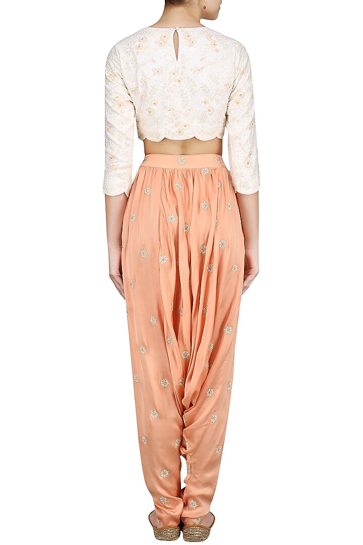 Cream jaal embroidered crop top and drop crotch pants available only at Pernia's Pop Up Shop.