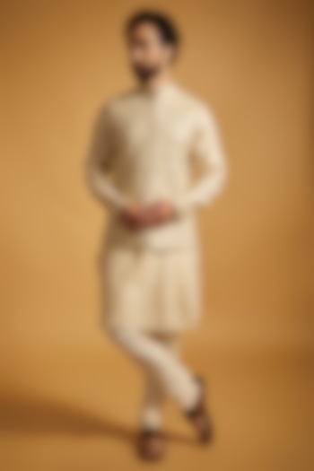 Beige Tussar Silk Floral Embroidered Bundi Jacket Set by Vanshik at Pernia's Pop Up Shop