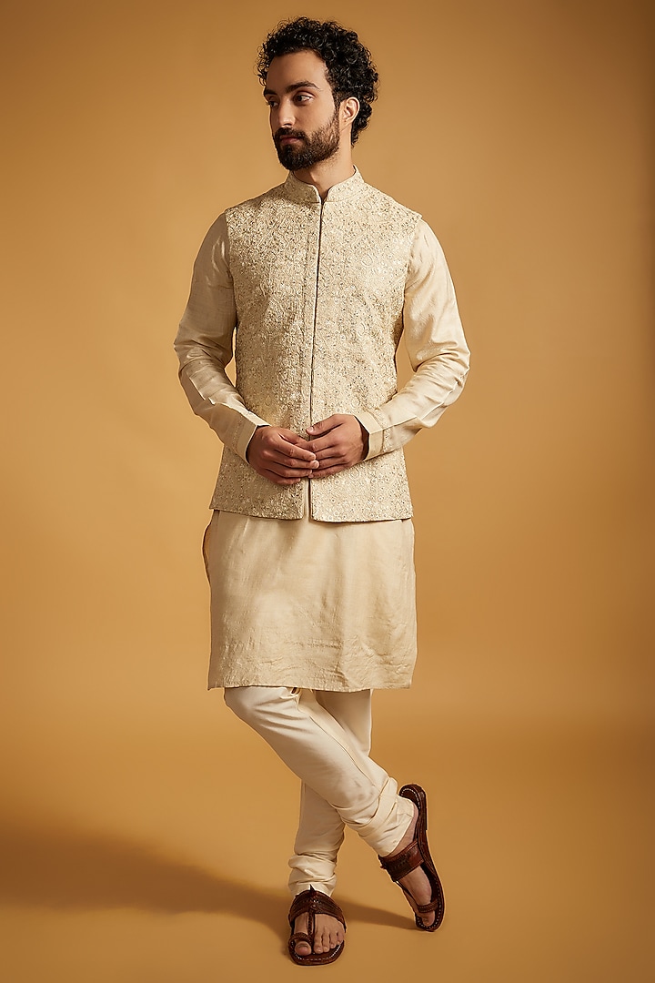 Beige Tussar Silk Floral Embroidered Bundi Jacket Set by Vanshik at Pernia's Pop Up Shop