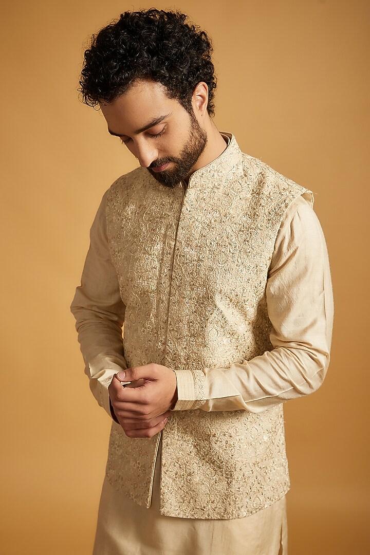 Beige Tussar Silk Floral Embroidered Bundi Jacket Set by Vanshik at Pernia's Pop Up Shop