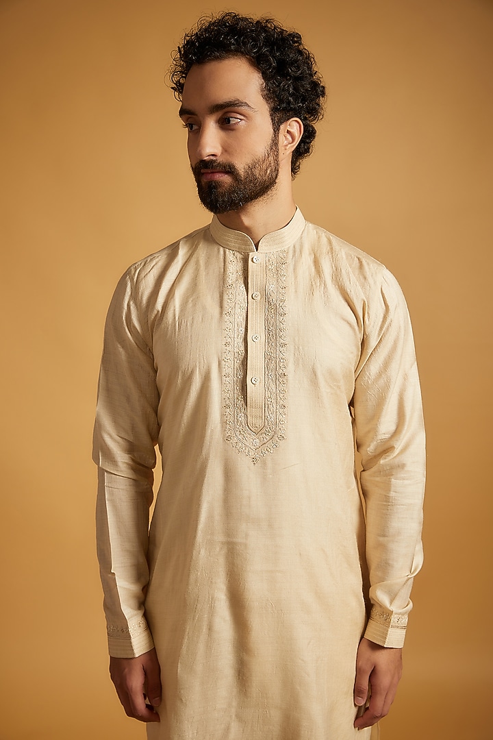 Beige Tussar Silk Floral Embroidered Bundi Jacket Set by Vanshik at Pernia's Pop Up Shop