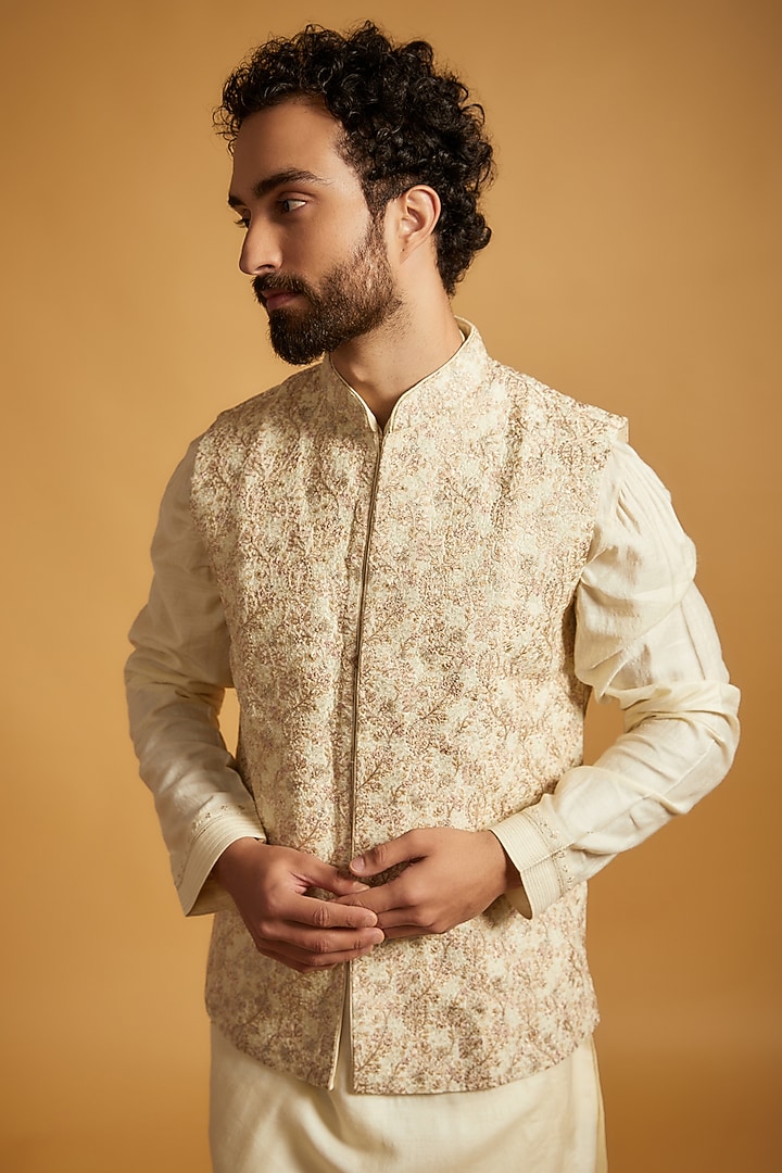 Cream Tussar Silk Floral Embroidered Bundi Jacket Set by Vanshik at Pernia's Pop Up Shop