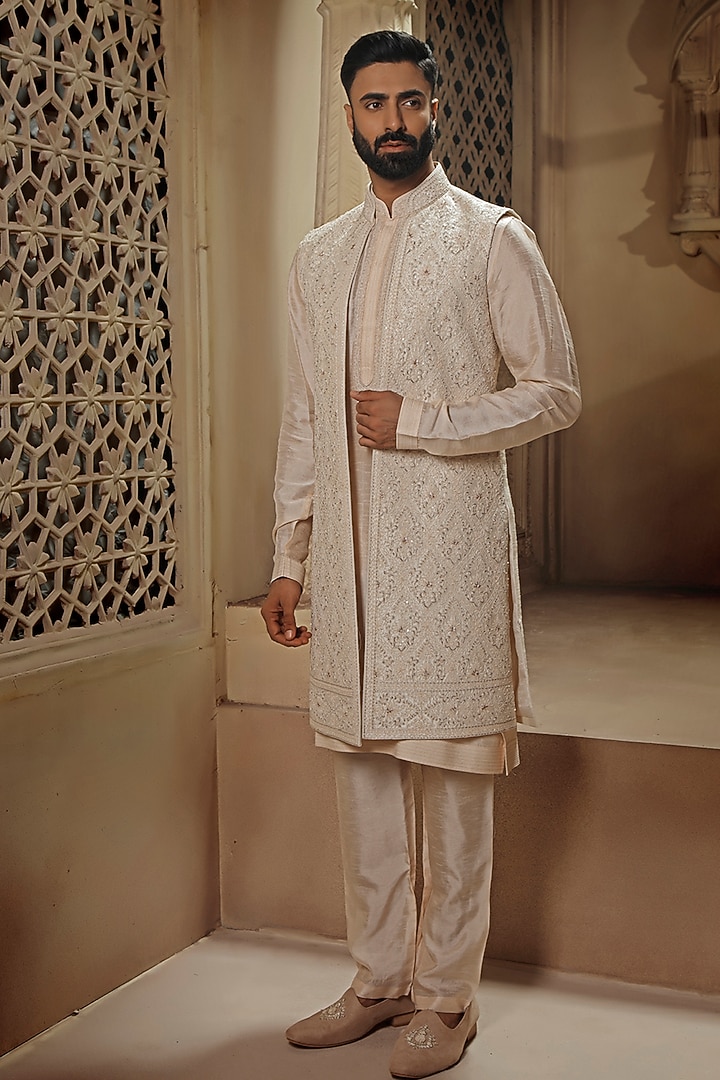 Pearl White & Blush Pink Raw Silk Resham Embroidered Bundi Jacket Set by Vanshik at Pernia's Pop Up Shop