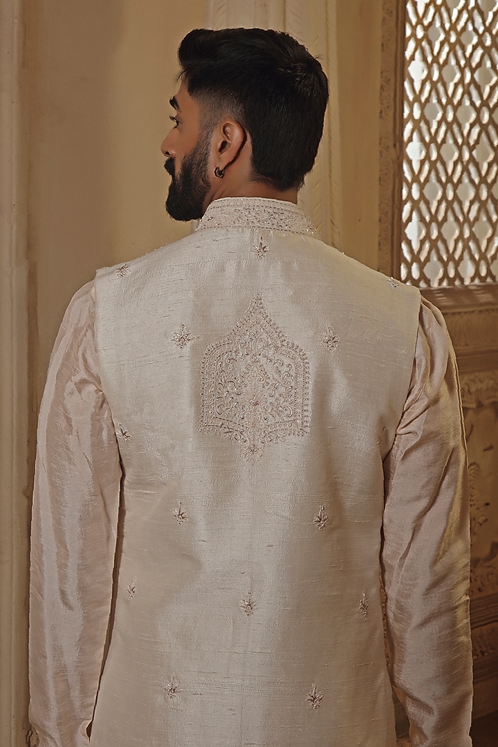 Pearl White & Blush Pink Raw Silk Resham Embroidered Bundi Jacket Set by Vanshik at Pernia's Pop Up Shop