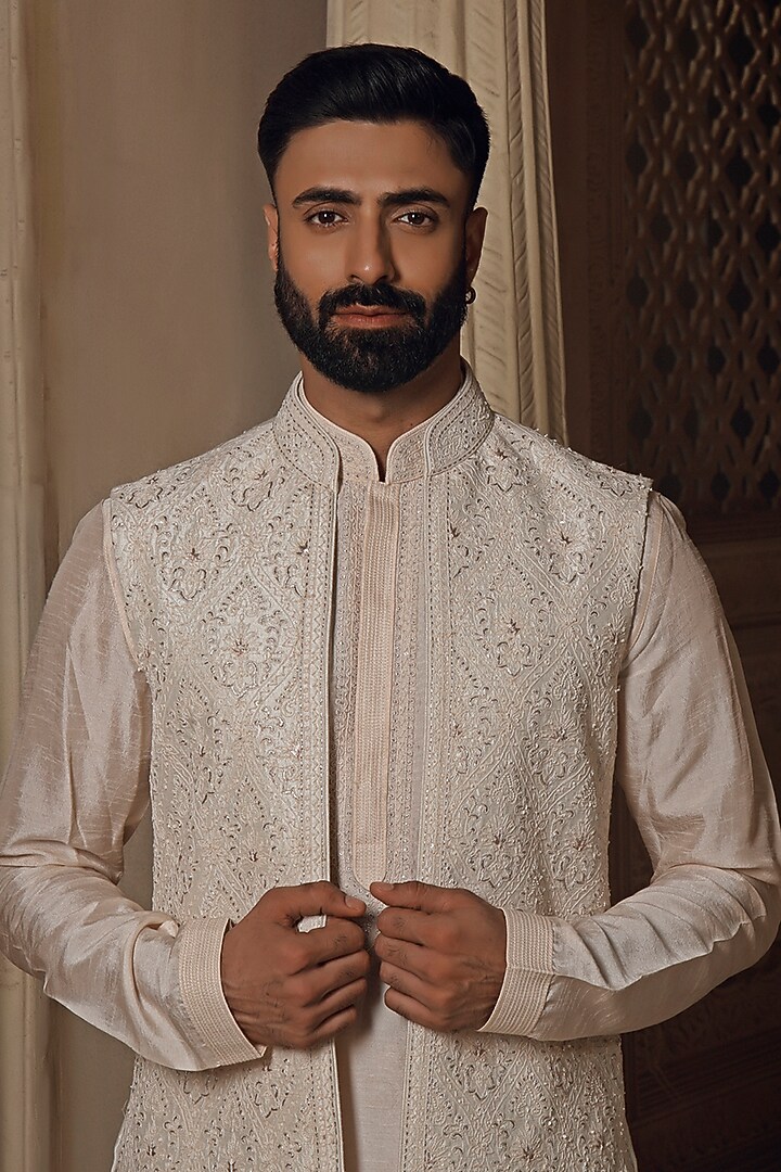 Pearl White & Blush Pink Raw Silk Resham Embroidered Bundi Jacket Set by Vanshik at Pernia's Pop Up Shop