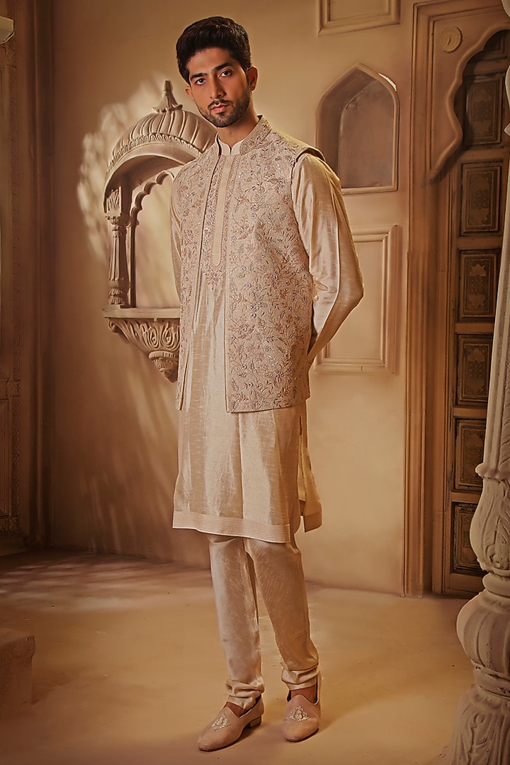 Beige Raw Silk Thread Embroidered Bundi Jacket Set by Vanshik at Pernia's Pop Up Shop