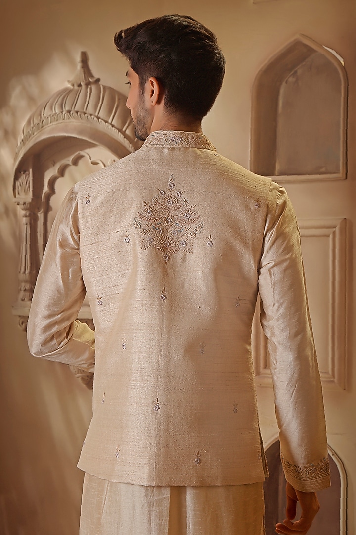 Beige Raw Silk Thread Embroidered Bundi Jacket Set by Vanshik at Pernia's Pop Up Shop