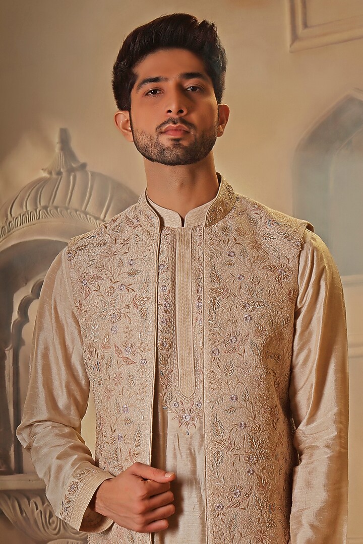 Beige Raw Silk Thread Embroidered Bundi Jacket Set by Vanshik at Pernia's Pop Up Shop
