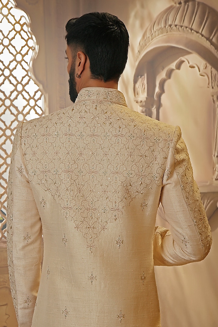 Pearl White Raw Silk Resham Floral Embroidered Groom Sherwani Set by Vanshik at Pernia's Pop Up Shop