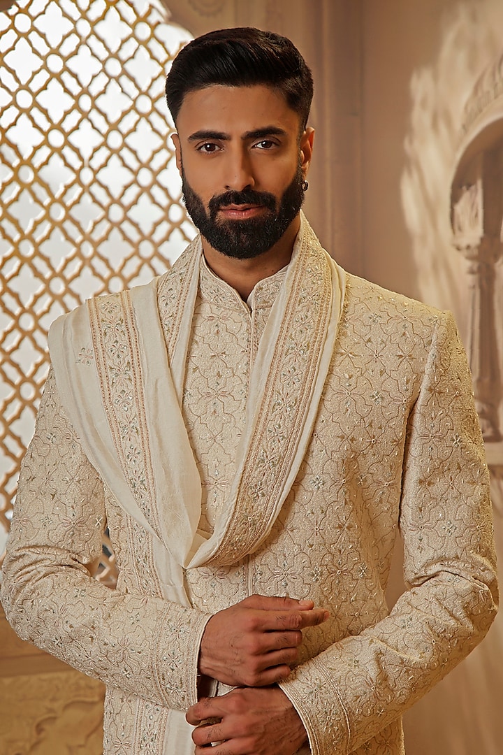 Pearl White Raw Silk Resham Floral Embroidered Groom Sherwani Set by Vanshik at Pernia's Pop Up Shop