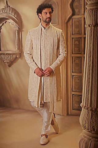 Pearl White Raw Silk Cutdana Embroidered Sherwani Set by Vanshik