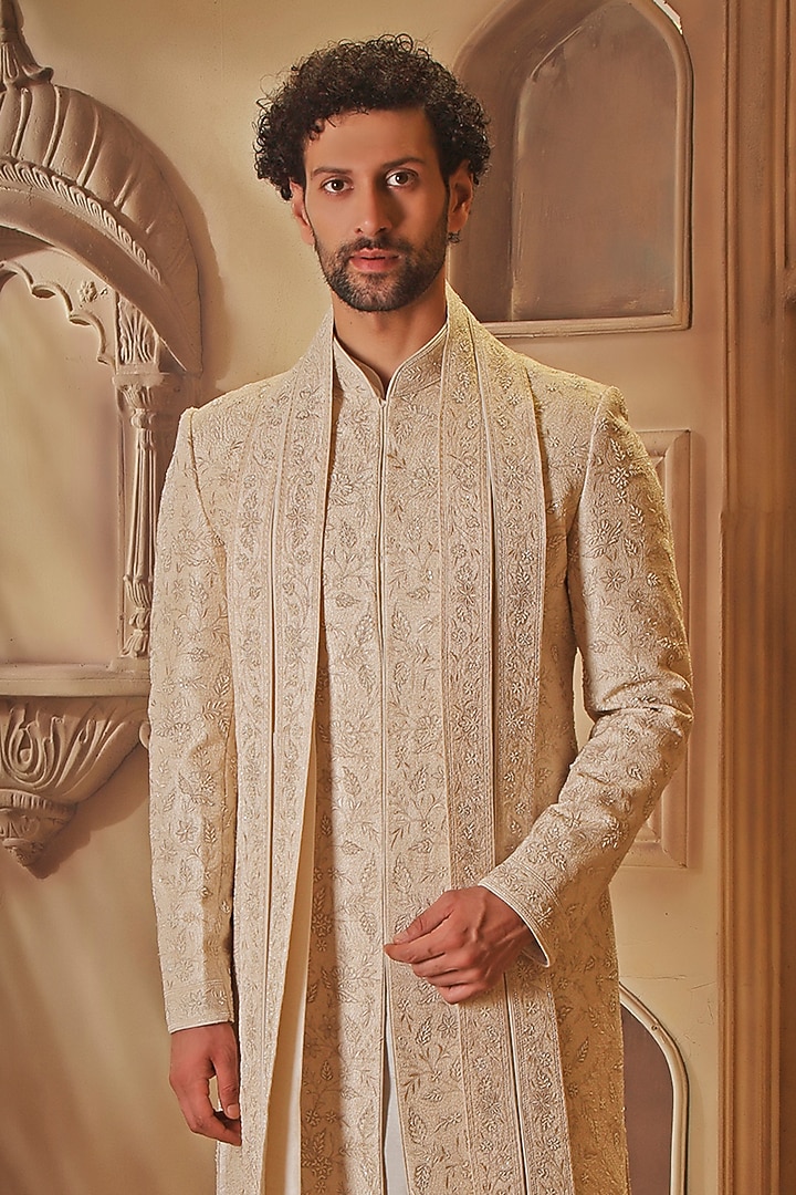 Pearl White Raw Silk Cutdana Embroidered Groom Sherwani Set by Vanshik at Pernia's Pop Up Shop