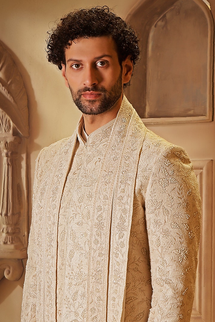 Pearl White Raw Silk Cutdana Embroidered Groom Sherwani Set by Vanshik at Pernia's Pop Up Shop