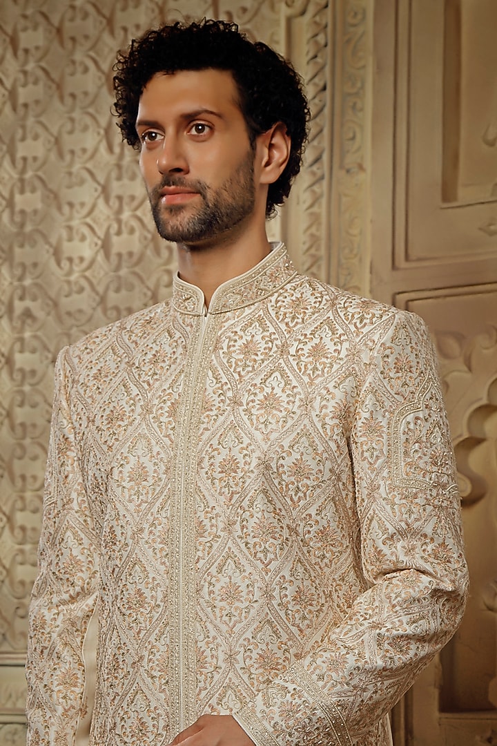 Pearl White Raw Silk Resham Embroidered Groom Sherwani Set by Vanshik at Pernia's Pop Up Shop