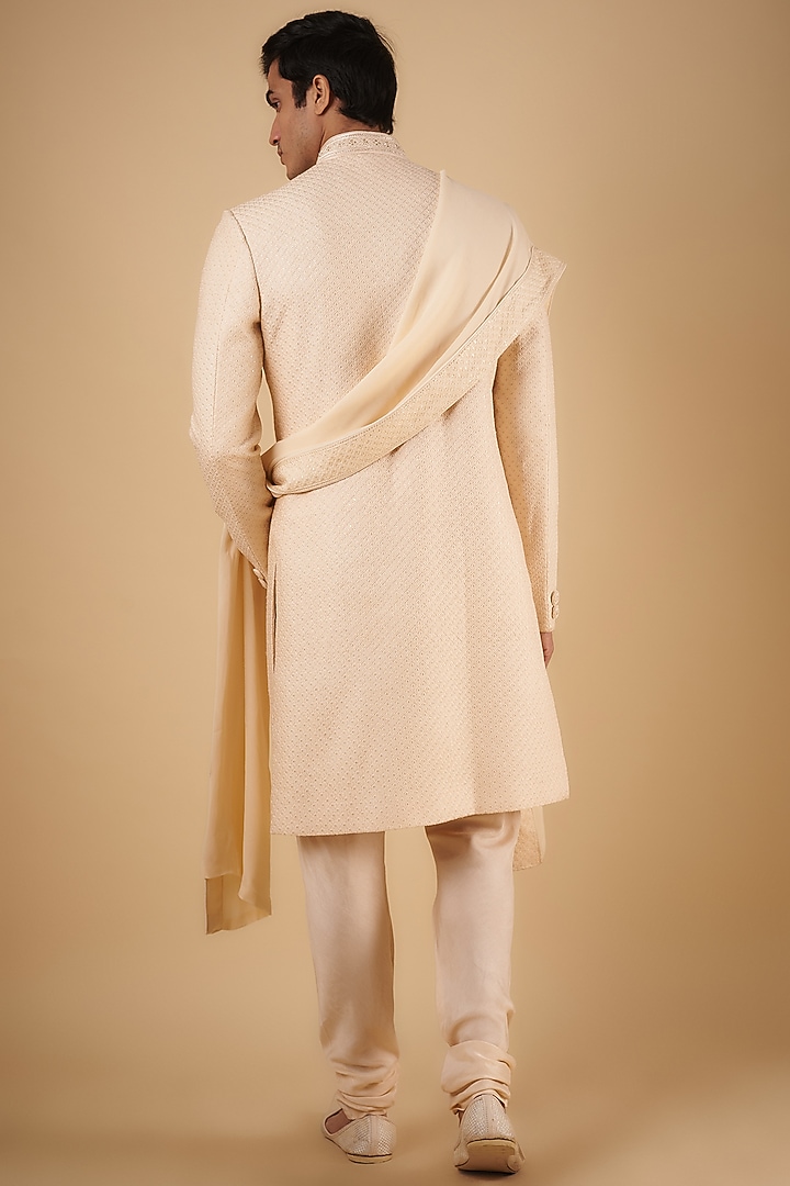 Blush Pink Silk Textured Wedding Sherwani Set by Vanshik at Pernia's Pop Up Shop