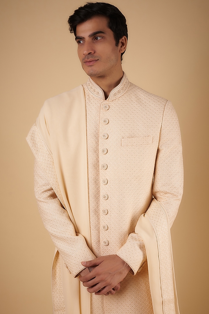 Blush Pink Silk Textured Wedding Sherwani Set by Vanshik at Pernia's Pop Up Shop