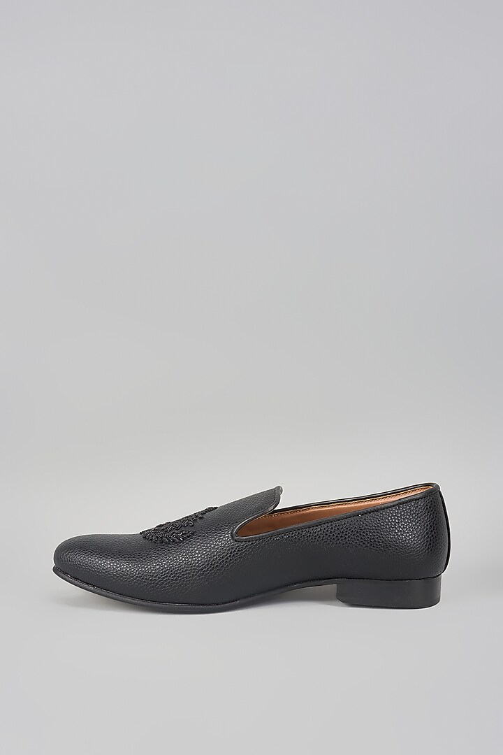 Black Leather Motif Embroidered Mojaris by Vanshik at Pernia's Pop Up Shop