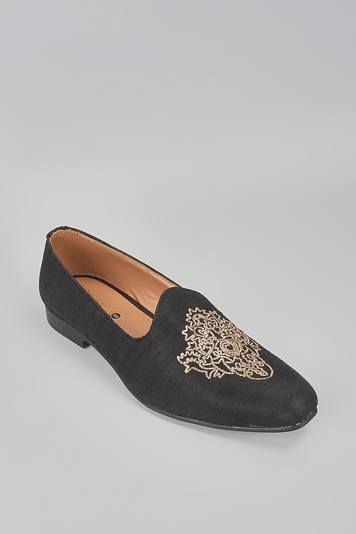 Black Raw Silk Motif Embroidered Mojaris by Vanshik