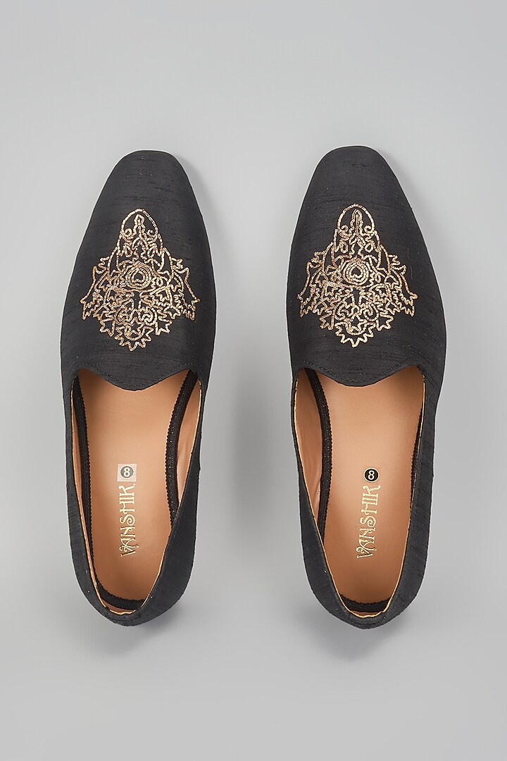 Black Raw Silk Motif Embroidered Mojaris by Vanshik at Pernia's Pop Up Shop