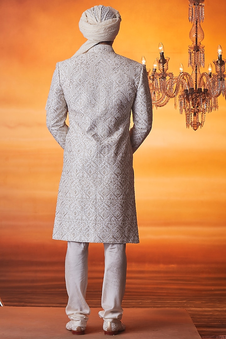 Ivory Raw Silk Pearl Embroidered Groom Sherwani Set by Vanshik at Pernia's Pop Up Shop