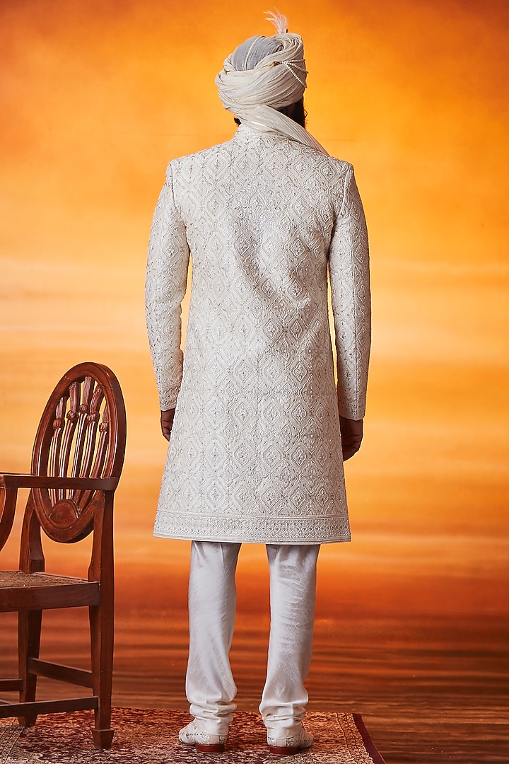 Pearl White Raw Silk Pearl Embroidered Groom Sherwani Set by Vanshik at Pernia's Pop Up Shop