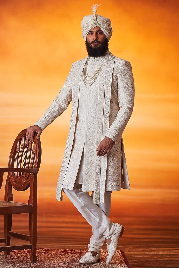 Pearl White Raw Silk Pearl Embroidered Groom Sherwani Set by Vanshik at Pernia's Pop Up Shop