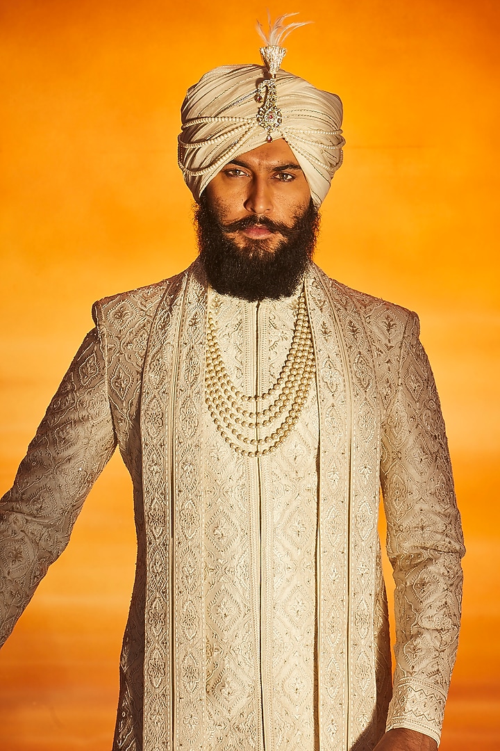 Pearl White Raw Silk Pearl Embroidered Groom Sherwani Set by Vanshik at Pernia's Pop Up Shop
