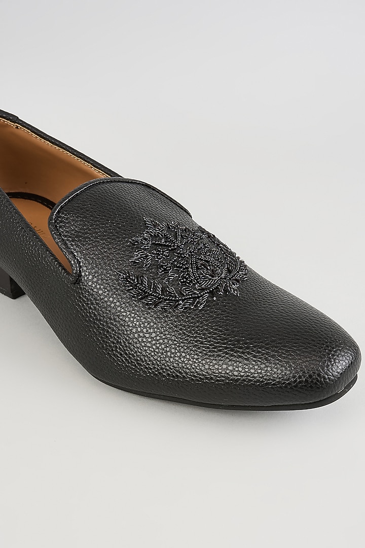 Black Leather Motif Embroidered Mojaris by Vanshik at Pernia's Pop Up Shop