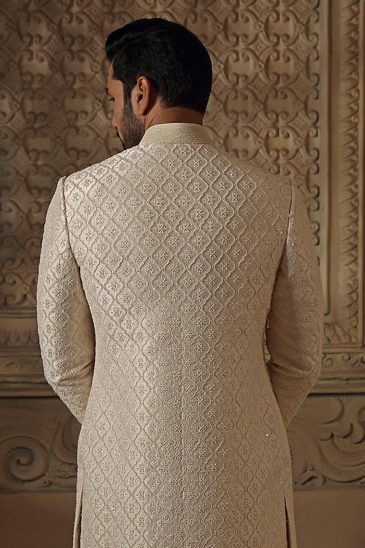 Pearl-Colored Raw Silk Pearl Embroidered Groom Sherwani Set by Vanshik at Pernia's Pop Up Shop
