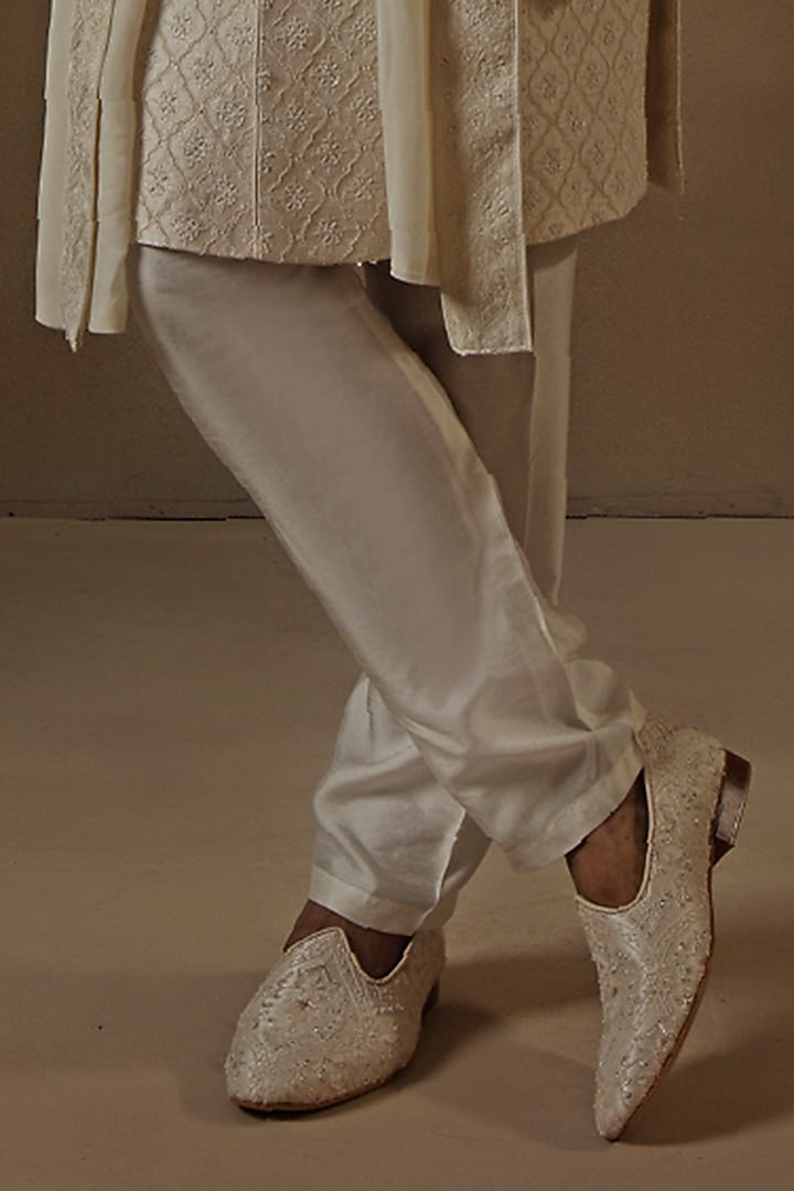 Pearl-Colored Raw Silk Pearl Embroidered Groom Sherwani Set by Vanshik at Pernia's Pop Up Shop