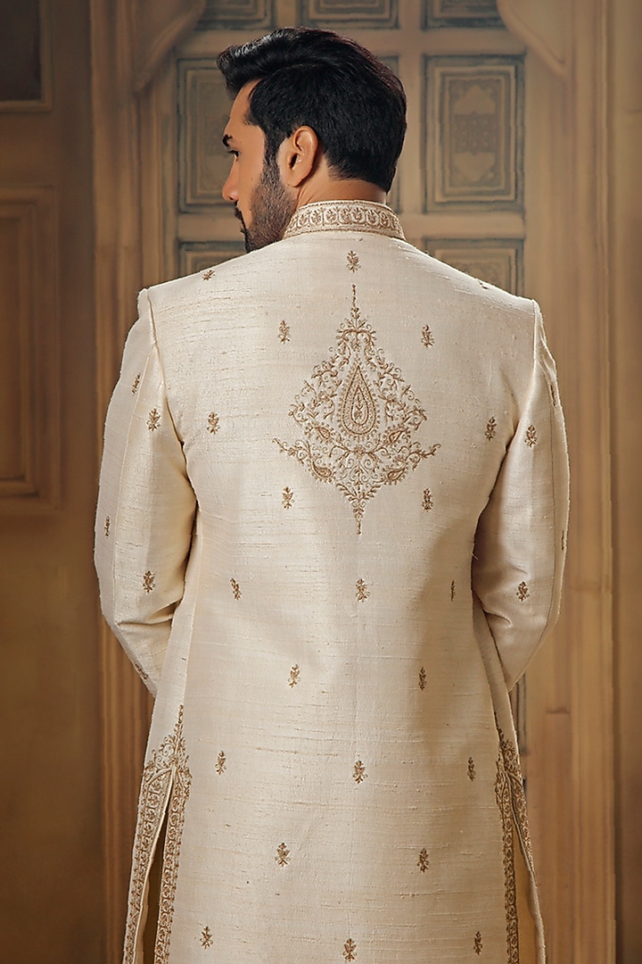 Pearl White Raw Silk Tilla Embroidered Groom Sherwani Set by Vanshik at Pernia's Pop Up Shop