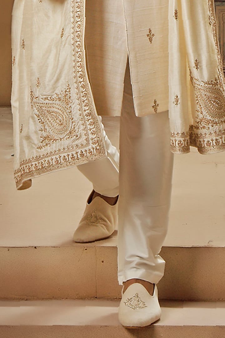 Pearl White Raw Silk Tilla Embroidered Groom Sherwani Set by Vanshik at Pernia's Pop Up Shop