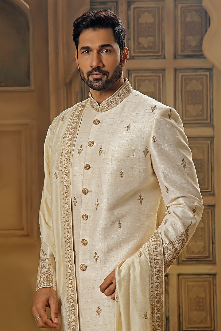 Pearl White Raw Silk Tilla Embroidered Groom Sherwani Set by Vanshik at Pernia's Pop Up Shop