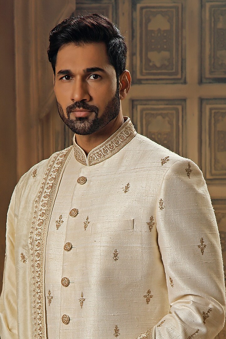 Pearl White Raw Silk Tilla Embroidered Groom Sherwani Set by Vanshik at Pernia's Pop Up Shop