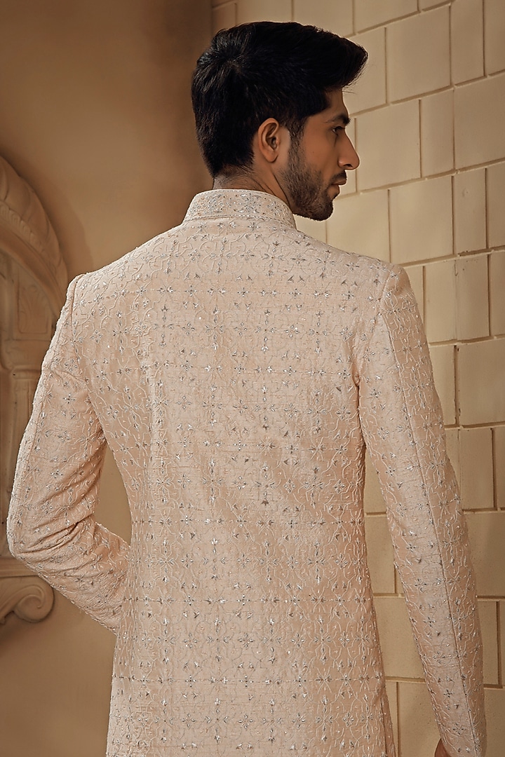 Blush Pink Raw Silk Jaal Embroidered Groom Sherwani Set by Vanshik at Pernia's Pop Up Shop