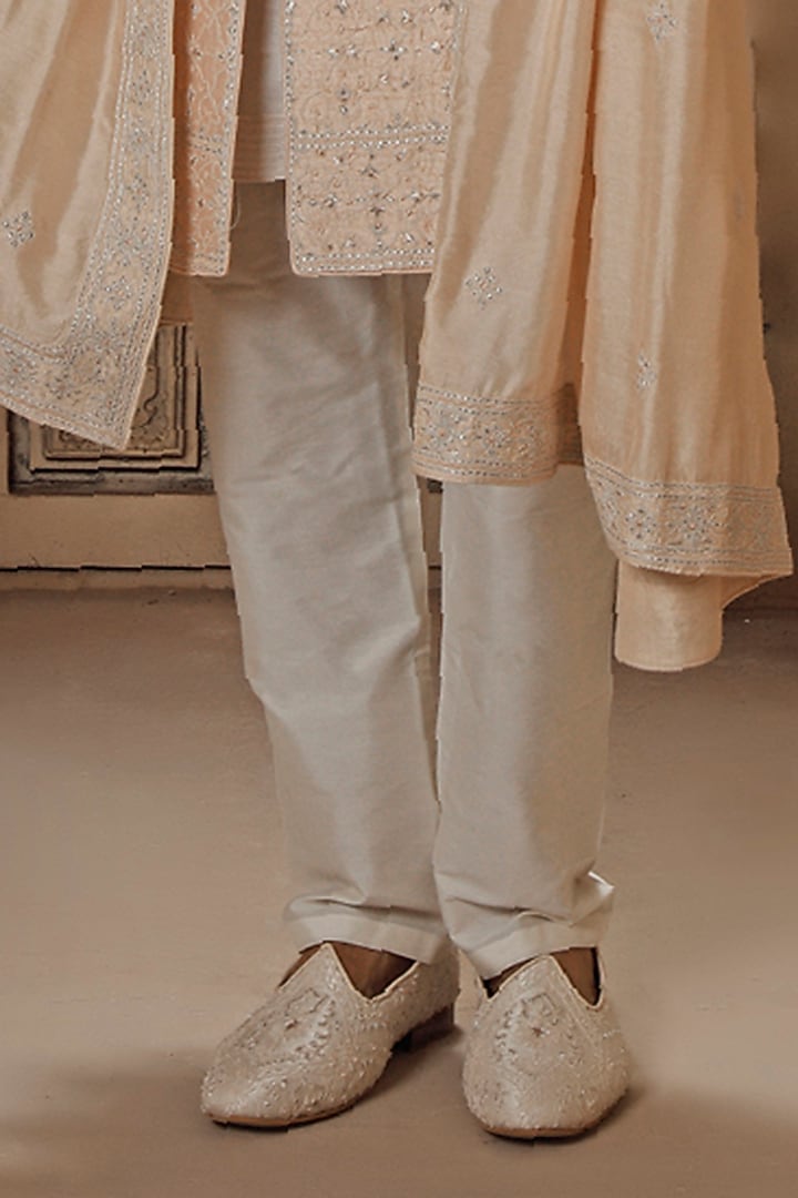 Blush Pink Raw Silk Jaal Embroidered Groom Sherwani Set by Vanshik at Pernia's Pop Up Shop