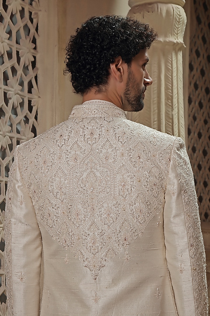 Pearl White Raw Silk Jaal Embroidered Groom Sherwani Set by Vanshik at Pernia's Pop Up Shop