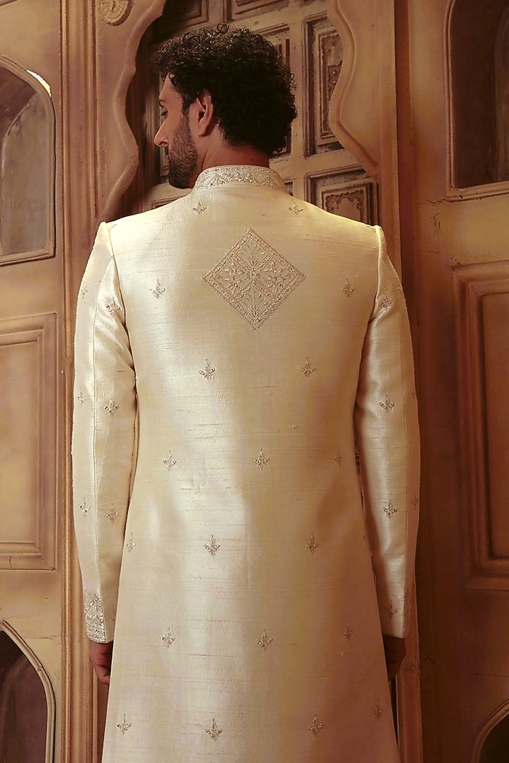 Pearl White Raw Silk Mirror Embroidered Groom Sherwani Set by Vanshik at Pernia's Pop Up Shop